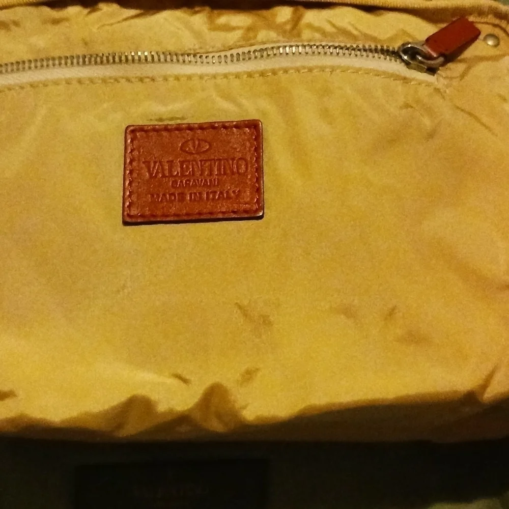 Valentino Garavani pouch.
